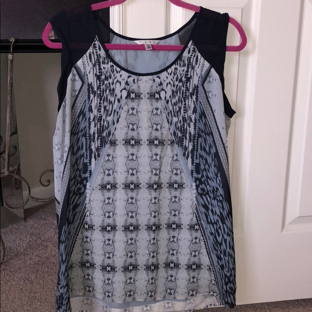 Women’s Cabi sleeveless blouse.